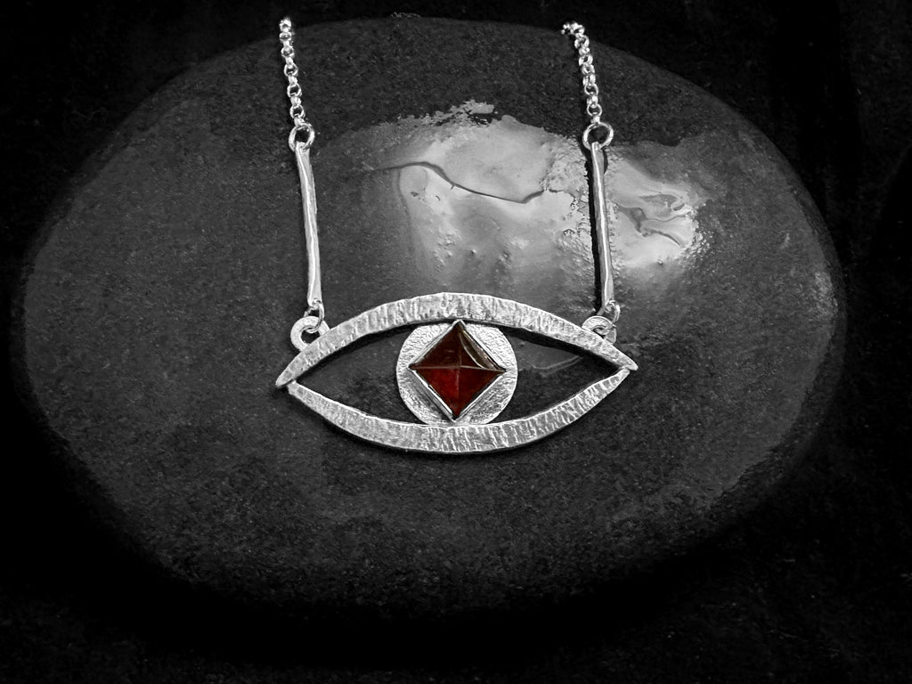 Divining Eye handcrafted silver pendant with red garnet